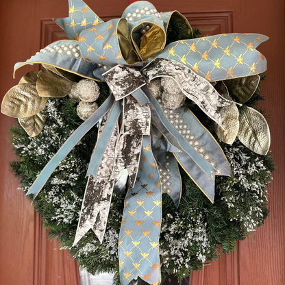 Decorative wreath with a large bow on a door